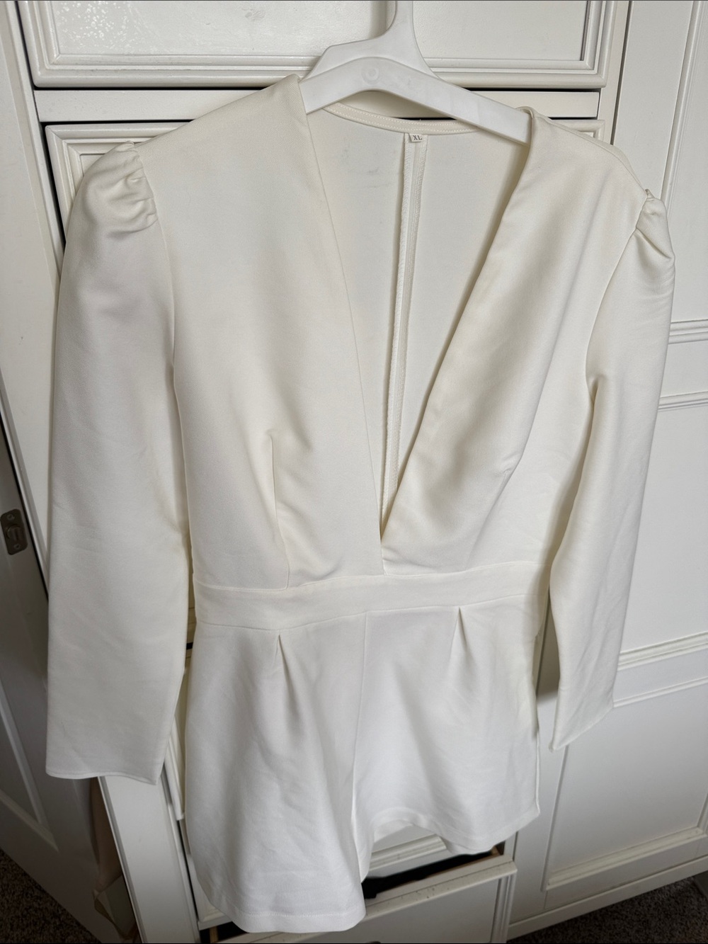 Women’s White Peplum Jumpsuit - Elegant V-Neck